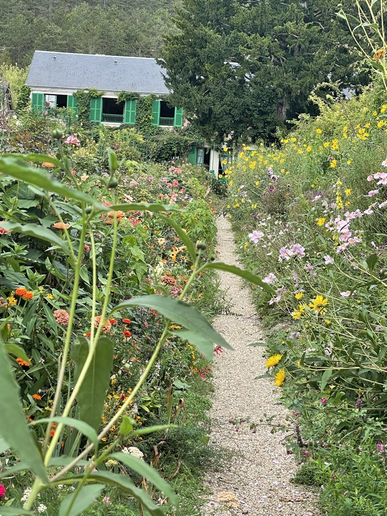 Clos Normand garden, Giverny, Francy, Normandy, flowers, roses, irises, tulips, peonies with pathways. Monet. Monet's paintings
