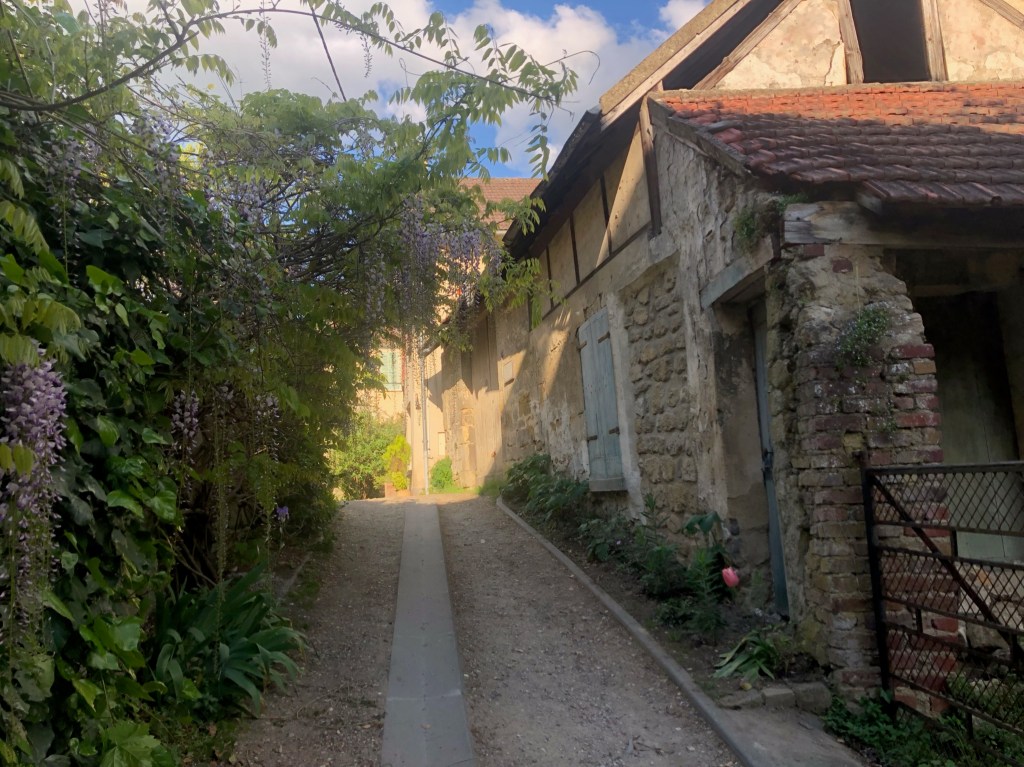 Housing in France. Stone farm house in small village in northern Normandy
